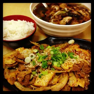 a bowl of rice and a bowl of mushrooms