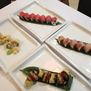 a variety of sushi dishes