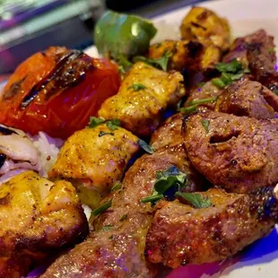 a plate of grilled meat and vegetables