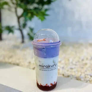 Korean strawberry milk with ube foam