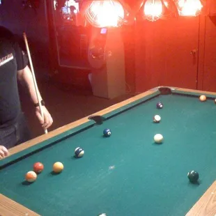 a pool table with balls on it