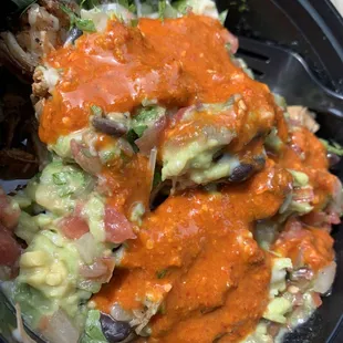 Hot sauce on top. Fair food. Not great but not bad.