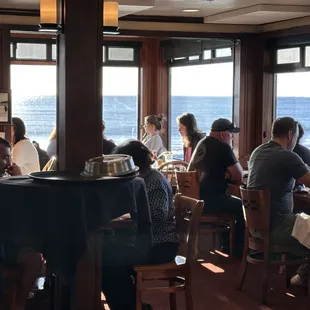 a group of people sitting at a table