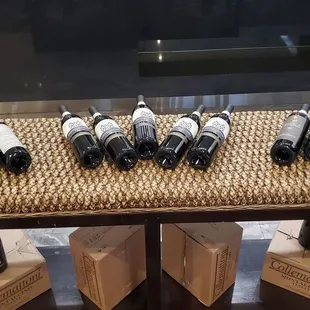 a selection of wine bottles on a table