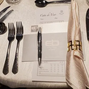 a place setting with silverware