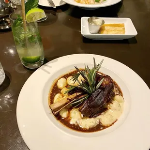 New Zealand Lamb Shank (front) &amp; Mushroom Barley Risotto (back)