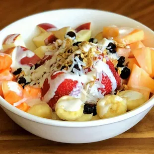 a bowl of fruit and yogurt