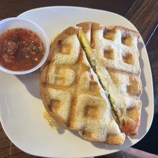 Delicious breakfast sandwich pressed in a waffle iron - YES!