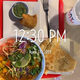 a plate of food on a tray