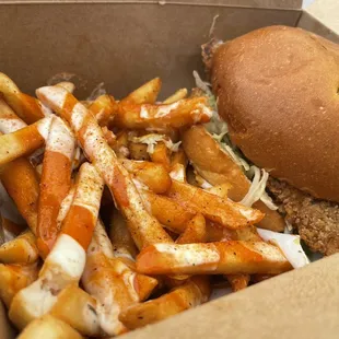 a burger and fries in a box