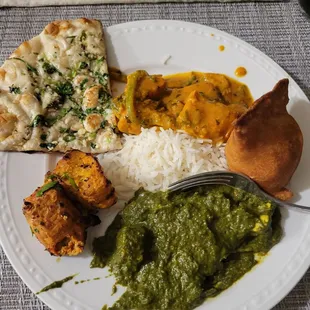 Garlic Naan, veggie samosa, sang paneer, chicken tikka, chicken tikka marsala. Wow great flavor.