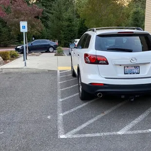 Owner parks his car blocking disabled ramp and demands &quot;proof&quot; of disabled person who wanted to park in disabled spot and use the ramp.