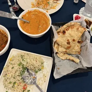 Plain naan, Butter chicken, Lamb korma and Ghee rice.