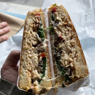 Mozzarella Chicken Sandwich on Sliced Sourdough, hot, flavorful, delicious. For a light lunch, split half/half with a friend. =)