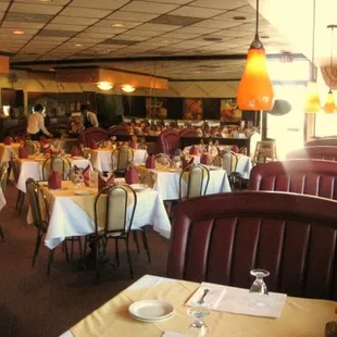 a restaurant with tables and chairs