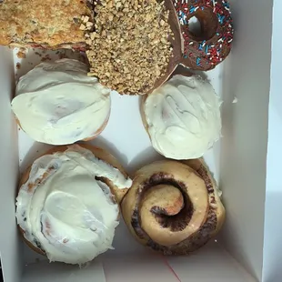 a variety of doughnuts in a box