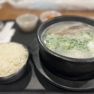 a bowl of soup and a bowl of rice