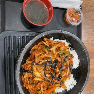 a plate of food on a tray