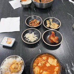 Yukaejang at the top. Seafood soon dubu at the bottom. Banchan in the center was kimchi, fishcake, pickled radish, and radish kimchi.