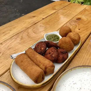Beef Rolls (first) - Parippu Vade (mid) - Polos Cutlets (last)