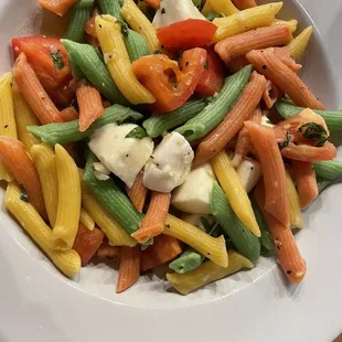 a plate of pasta and vegetables