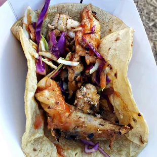 Woody's fish tacos with mirliton slaw