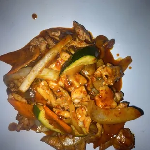 a plate of stir fried vegetables
