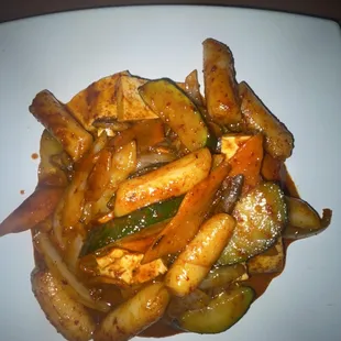 a plate of stir fried vegetables