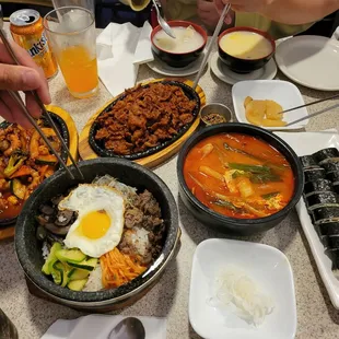 a table full of asian food