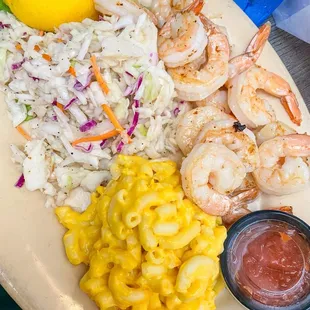 Shrimp dinner (grilled &amp; no seasoning) with coleslaw and Mac and cheese.