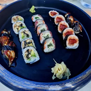 Eel avocado roll, rainbow roll, triple tuna roll, and unagi