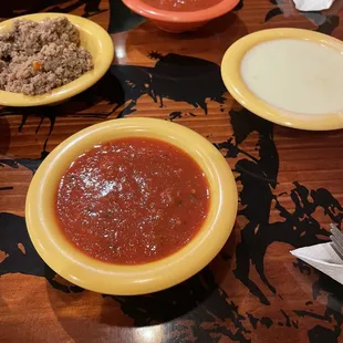 Salsa,cheese sauce and seasoned meat