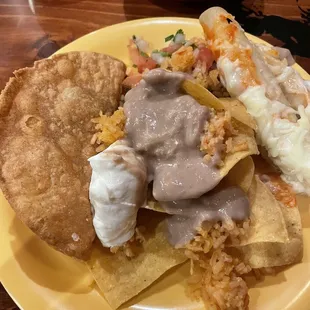Fried taco   Nachos. Rice and beans enchilada with pico