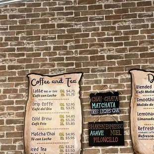 menus on a brick wall