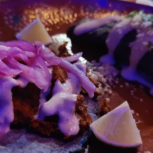 Pastor taco and Elote empanada