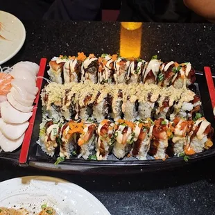 Sashimi, smoked salmon, crunch and rainbow rolls