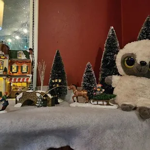 Morty w/ the Christmas Village display :)