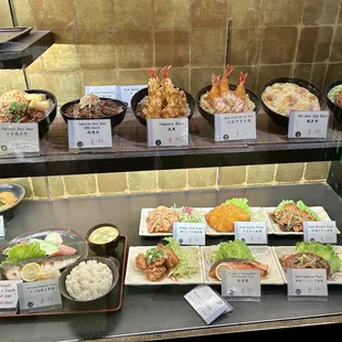 Display case of food/prices