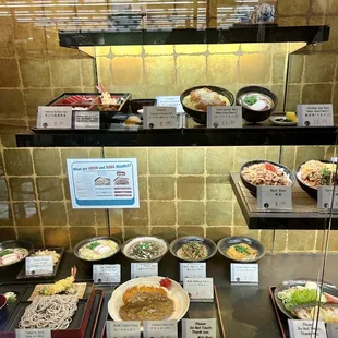Display case with food/prices