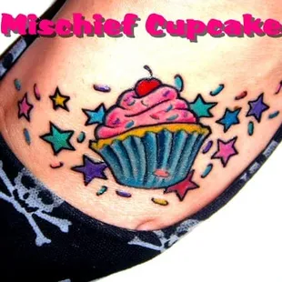 a tattoo of a cupcake