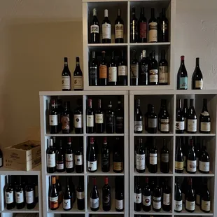 wine bottles on shelves