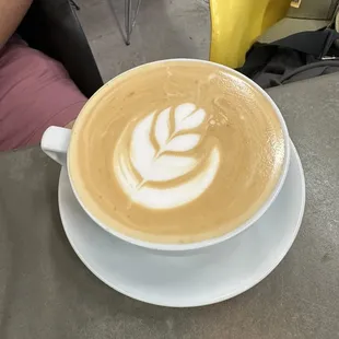 a latte in a white cup