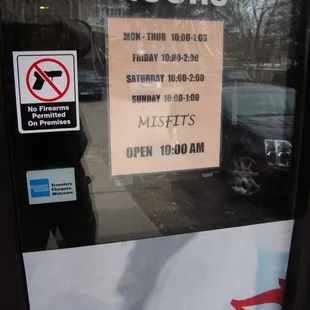 Hours of operation, front entry door.