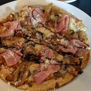 Prosciutto funghi apizza