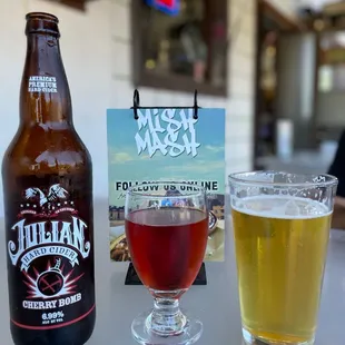 a beer and a glass on a table