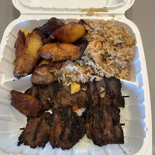 Steak kabob with two sides (plantains and chaufa rice)