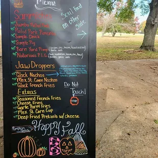 a chalk board with a menu on it