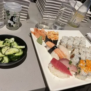 Cucumber salad and sushi