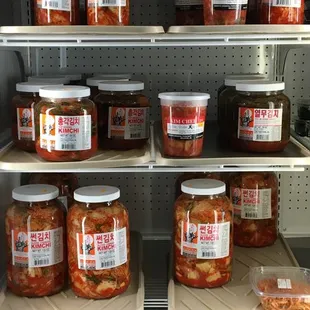 Variety of kimchee, including homemade by the owner!