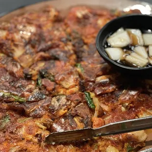 Beef ribs, chicken and kimchi pancake.